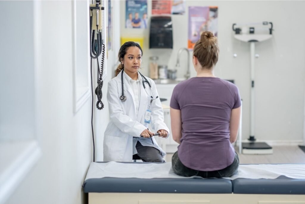 Woman with doctor