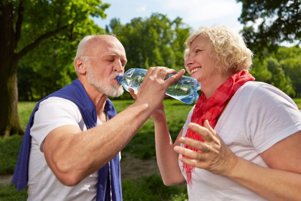 Older adults drinking water