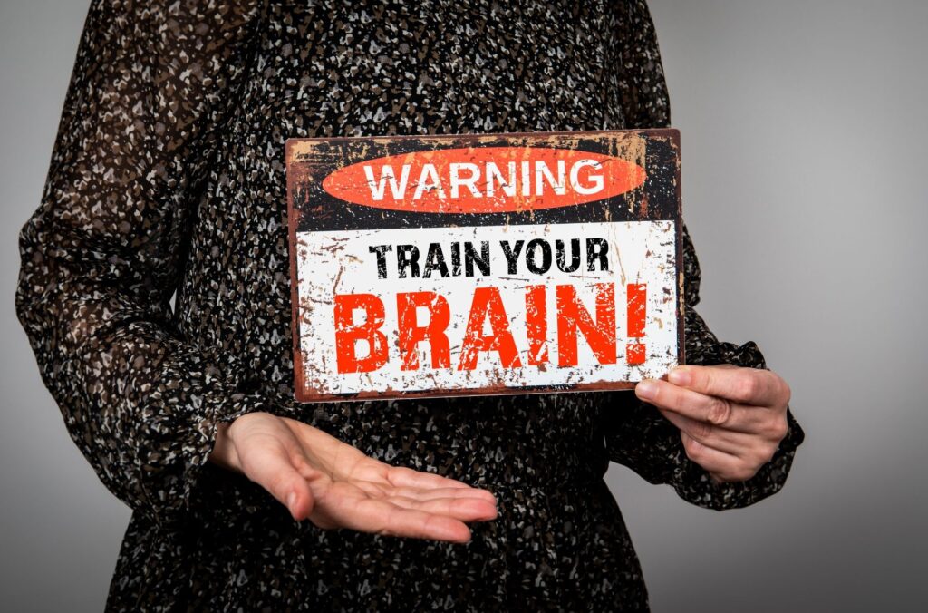 Woman with warning sign